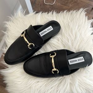 Steve Madden size 6.5 black mules.  They run small. Fit like size 6. Never worn